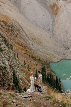 Couple saying vows on a rock above turquoise lake in the mountains. San Juan Mountains Colorado Elopement, Aspen Elopement, Private Elopement, Elope In Colorado, Photoshoot Moodboard, Sunrise Wedding, Dark Green Bridesmaid Dress, Sunrise Elopement, Elopement Colorado