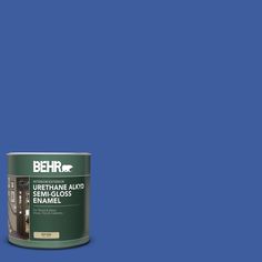 a can of behr paint on a blue background