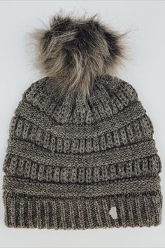 A little Lake Tahoe is hand sewn on this cute grey cable knit beanie for all your adventures. Wear this cozy and stylish beanie with any outfit. https://thirtynineonetwenty.com/product/charcoal-grey-beanie/ #knitbeanie #pompombeanie #tahoehat #womensstyle #styleinspo #laketahoe #tahoe #casualoutfit #ootd #winterbeanie #tahoebeanie #knitbeanie #hat #winterhat #beanie #gifts #giftideas #handmadegifts #giftsforher #winterstyle #winterstyleideas #cutebeanie #pombeanie #winteroutfits Cute Winter Hat, Cable Knit Beanie, Cute Beanies, Grey Beanie, Winter Beanie, Pom Beanie, Fur Pom Pom, Lake Tahoe, Knit Beanie