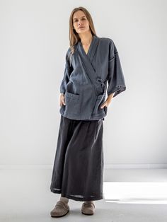 "Minimalist linen kimono jacket with raw-edge details. If you're interested in a longer medium-weight option with belt, check our jacket FUDO. STYLE DETAILS * Loose fit * Kimono sleeves & collar * Raw-edge details on the collar, sleeves & pockets * Patch pockets * Side slits * Tie strings inside and outside for better fit * French seams inside * Made from heavy-weight linen SIZES & COLORS IN PICTURES * Model 1 wears size M in color Dark Grey Heavy. She is 176 cm (5'9\"). Bust - 81 cm (32\"), waist - 67 cm (26\"), hips - 90 cm (35\").  * Model 2 wears size m in color Dark Grey Heavy. She is 178 cm (5'10\"). Bust - 85 cm (33\"), waist - 63 cm (25\"), hips - 86 cm (34\"). NOTES ON SIZING & COLORS * Please note that linen shrinkage during the softening process cannot be predicted precisely. Th Casual Linen Kimono With Relaxed Fit, Casual Linen Kimono With Kimono Sleeves, Casual Linen Kimono For Spring, Spring Casual Linen Kimono, Fall Long Sleeve Linen Kimono, Spring Linen Outerwear With Kimono Sleeves, Linen Kimono With Relaxed Fit, Kimono Linen, Linen Jackets Women