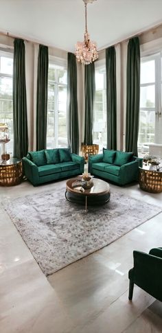 a living room filled with green couches and chairs in front of two large windows