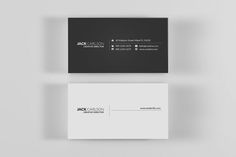 a black and white business card on top of a gray surface with the words jack carlton