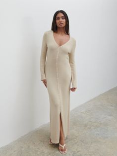 Product Details V-Neckline Non Functional Button Front Slim Subtle Fluted Sleeve Midaxi Length Body Skimming Fit Composition 56% Nylon 44% Polyester Maternity Outfits, Knit Maxi Dress, Fall Fit, Iced Latte, Fall Fits, Maxi Knit Dress, Knitwear Tops, Trending Now, Maternity Clothes