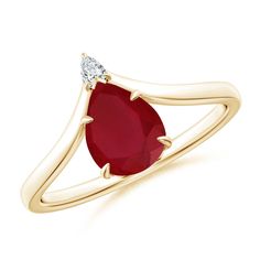 a yellow gold ring with an oval shaped ruby stone and two diamonds on the side