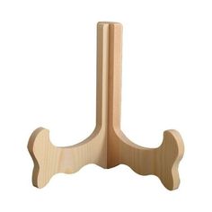 a wooden coat rack on a white background