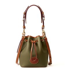 A Compact Classic    This shoulder bag staple, made from innovative long-lasting lightweight pebble leather, is a tiny classic which holds its shape when you set it down. Green Pebbled Leather Bag For Everyday Use, Classic Pebbled Leather Bucket Bag For Travel, Monogram Pendant, Tan Cowhide, Key Hook, Credit Card Wallet, Dooney And Bourke, Dooney & Bourke, Green Fashion