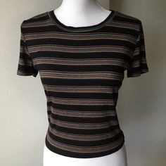 This Is A Brand New Knit Top In Size Large From Forever 21. It's Black With Colored Stripes. It Measures 16.5" From Underarm To Underarm And 19" From Top Of Shoulder To Bottom Hem. Goes With So Much! Thanks So Much For Looking. We Have A Very Clean, Smoke-Free Home. Text With Any Questions. Forever 21 Striped Cotton Tops, Casual Striped Tops From Forever 21, Forever 21 Black Short Sleeve Top, Forever 21 Black Crew Neck T-shirt, Forever 21 Black Crop Top, Forever 21 Black Short Sleeve T-shirt, Casual Fitted Multicolor Tops, Forever 21 Black Casual T-shirt, Fitted Casual Multicolor Tops