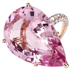 The statement ring featuring a certified 35.73 carats pear-shaped natural pink morganite; GIA #1152101549. The stone is set in a bespoke 18K rose gold mounting consisting of a diamond micro pave-encrusted basket and pave-set shank with three rows of diamonds, 148 F/VS ideal cut diamonds - 2.00-carat total weight. Finger size: US - 5 3/4 Leon Mege, Morganite Diamond Ring, Micro Pave Ring, Pear Shaped Ring, Vintage Cocktail Ring, Morganite Diamond, Engagement Ring Shapes, Gold Cocktail Ring, Three Stone Diamond