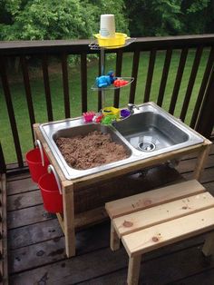 an outdoor kitchen made out of pallet wood and other materials is featured in this ad