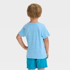 Bring classic style to your little one's collection of tees with this Short-Sleeve Pocket T-Shirt from Cat & Jack™. Crafted from midweight jersey fabric, this short-sleeve T-shirt brings cool comfort to their day, while the below-hip length gives them the option of wearing it tucked in or untucked. Designed in a solid hue with a chest patch pocket, this crewneck tee makes a great pairing with different shorts, leggings or pants for versatile outfit options. Cat & Jack™: Designed for all children Soft-washed Cotton Tops For Playwear, Playful Solid Color Tops For Playwear, Basic Cotton T-shirt For Playwear, Basic Short Sleeve T-shirt For Play, Playful Soft-washed Tops For Playtime, Soft-washed Crew Neck T-shirt For Playtime, Cotton Crew Neck T-shirt For Playwear, Soft-washed Crew Neck Tops For Playtime, Playful Short Sleeve Top