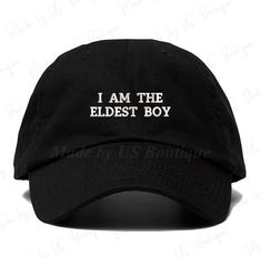 i am the oldest boy baseball cap in black with white letters on it and an embroidered back