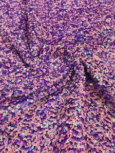 Stretch Velvet Sequins This beautiful design is a stretch velvet fabric that has sequins embroidered throughout the whole fabric. This fabric is ideal for decorative and apparel purposes. The width of the velvet fabric is 60" and the sequins are embroidered at 58"/ 60". Item is sold by the yard. If more than one yard is purchased, item will come in one piece. Details 5mm Sequins2 - Way Stretch Width: Stretch Velvet 58"/60"Content: 85% Polyester Please Note: *The digital images we display have th Mermaid Sequin Fabric, Lavender Uses, Pink Iridescent, Mermaid Sequin, Lavender Pink, The Velvet, Stretch Velvet, Sequin Fabric, 2 Way