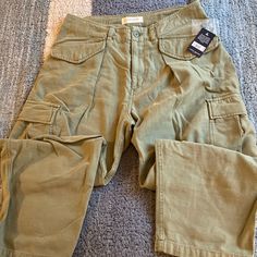 Nwt Lucky Brand Relaxed Military Cargo Pants-Olive. Size 10. 16 Inch Waist, 12 Inch Rise, 24.5 Inseam (Meant To Fall Short). Olive Cargo Pants For Fall, Olive Cargo Style Pants For Fall, High-waist Olive Pants With Pockets, Olive High-waist Pants With Pockets, Olive High Waist Utility Bottoms, Military Style Wide Leg Khaki Bottoms, High Rise Khaki Cargo Pants For Fall, High Waist Military Pants In Khaki, Military Style Khaki Wide Leg Bottoms