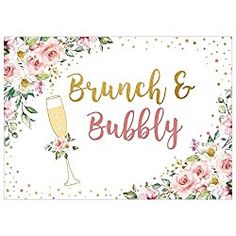 a floral brunch and bubbly sign with champagne glasses on it's side