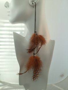 These are GORGEOUS! Orange tones are playful or professional depending on how you dress...  (dangled in chains) improves both work and play.  These beautiful earrings were crafted using guinea feathers and gunmetal chain. 11 inche length from the top of the surgical steel ear wires to the bottom of the feathers.  Comes in silk canvass bag. Orange Tones, Chic Bohemian, Feather Jewelry, Punk Jewelry, Feather Earrings, Bohemian Chic, Chain Earrings, Saint Louis, Beautiful Earrings