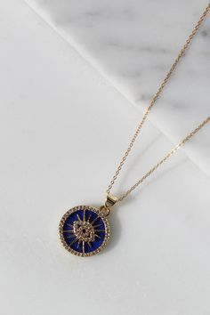 Good vibes only with this beautiful piece! 14k gold filled chain 18k gold filled enamel eye pendant set on a beautiful Lapis Lazuli Stone Enhance your jewelry collection with our stunning Lapis Lazuli Evil Eye Necklace, meticulously crafted in gold-filled material. This exquisite piece combines the timeless beauty of lapis lazuli with the protective charm of the evil eye, making it a perfect accessory for any occasion. Features: • Premium Quality: Our necklace features a genuine lapis lazuli sto Blue Medallion Jewelry With Adjustable Chain, Gold Enamel Medallion Necklace, Tarnish Resistant 14k Gold Blue Jewelry, Blue 14k Gold Tarnish-resistant Jewelry, Yellow Gold Enamel Jewelry With Adjustable Chain, Spiritual Evil Eye Medallion Jewelry, Blue 14k Gold Medallion Necklace, Blue Gold-plated Tarnish-resistant Jewelry, Blue Tarnish-resistant Gold-plated Jewelry