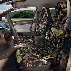 the interior of a car with butterflies all over it