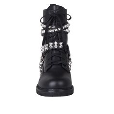 These vibrant and stylish boots will let you enter the world with style. These privileged boots, which are made of vegan leather and adorned with chains and studs, will stand out and provide an edgy edge to any ensemble. They are the ideal choice to transition your outfits from day to night, with an ankle buckle closure for a snug fit and a 1.5"H heel. These fashionable boots are ideal for wearing with jeans or skirts and are sure to draw attention. With these shoes, you'll undoubtedly feel pamp Spring Streetwear Boots With Reinforced Heel, Spring Streetwear Round Toe Heels, Trendy Ankle-high Leather Heels, Trendy Winter Heels With Round Toe, Trendy Lug Sole Heels For Spring, Trendy Spring Heels With Lug Sole, Trendy Summer Faux Leather Boots, Leather Heels For Streetwear, Trendy Faux Leather Boots