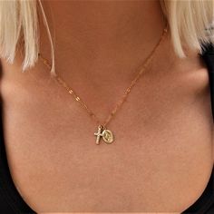 "The perfect religious necklace. Stay in trends with everyday pieces that are affordable, quality, handmade and beautiful. So chic, ethnic, Perfect for everyday wear; pair it with your favorite outfit! Layer with other necklaces or wear itself! L E T S . T A L K . N E C K L A C E S ✤ Available in 14k Gold Filled or Sterling Silver ✤ Medallions & Pendants are Gold Filled or Sterling Silver ✤ Dainty cross charm measures to 13 x 8 mm & dainty Virgin Mary coin measures to 12 x 9 mm ✤ Availab Personalized Spiritual Crucifix Necklace, Spiritual Cross Pendant Necklace For First Communion, Cross Necklace For First Communion, Personalized Spiritual Necklace For Baptism, Spiritual Personalized Necklace For Baptism, Dainty Choker Necklace, Catholic Necklace, Silver Cross Necklace, Sterling Silver Cross Necklace