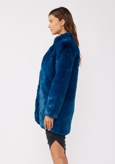 Add a bold statement to any outfit with our luxe faux fur coat. Featuring essential side pockets, a silky lining, and an incredibly soft hand feel. Perfect for chilly days and nights, this chic coat pairs well with denim and lace-up boots, or dressed up for a night out! FINAL SALE Vintage-inspired faux fur Oversized, relaxed fit Long sleeve Mid-length Side pockets Model is 5'9, wearing a size S.Style: I-20090WL Trendy Long Fur Coat With Faux Fur Lining, Trendy Long Coat With Faux Fur Lining, Casual Long Faux Fur Coat, Casual Long Fur Coat With Faux Fur Lining, Trendy Long Faux Fur Coat, Blue Fur Coat With Faux Fur Lining For Fall, Trendy Faux Fur Long Coat Outerwear, Casual Faux Fur Coat With Faux Fur Lining, Blue Fluffy Winter Outerwear