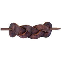 An elegantly intertwined accessory from back in the day! Our "Braided" Barrette has been loving crafted since 1971 and continues to be our best selling style. Barrette appearance may vary slightly from photos as every piece of leather is unique in tone and texture.    *Made from Full-Grain American Leather.    *Cut and braided by hand    *Secure in hair with durable wooden barrette stick (extra stick included with order).    *Measures 1’’ high by 5'' wide (4'' distance between barrette holes). Leather Trinkets, Diy Leather Hair Accessories, Leather Clips Hair, Leather Scrap Projects, Wood Hair Accessories, Leather Hair Cuff, Leather Projects Ideas, Leather Hair Pin, Leather Hair Wrap