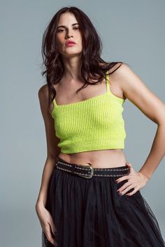 Step into summer with style in our eye-catching Lime Green Cropped Top, a must-have addition to your warm-weather wardrobe. Vibrant Lime Green Shade: This top's striking lime green color is sure to turn heads and add a pop of vibrant color to your outfit. Lightweight and Comfortable: Made from 100% Polyester, this top offers a light and breezy feel, perfect for those hot summer days. Model's Sizing for Perfect Fit: Our model, graced with the dimensions of 33-24-35 and standing at 5'8", wears a s Trendy Summer Camisole Tank Top, Green Summer Party Tank Top, Green Crop Top Camisole, Trendy Cropped Camisole With Adjustable Straps, Green Camisole Tank Top For Summer, Trendy Green Tops With Tank Straps, Trendy Fitted Camisole For Vacation, Green Summer Party Tops, Trendy Green Camisole Tank Top