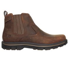 Handsome style and wonderful comfort are easy to get in the SKECHERS Relaxed Fit Segment - Dorton boot. Smooth oiled leather upper in a slip on casual ankle boot with stitching and overlay accents. Gel Infused Memory Foam insole. | Skechers Men's Relaxed Fit: Segment - Dorton Boots | Medium Width | | Smooth oiled leather upper | Slip on ankle height casual comfort boot design | Stitching accents | Rounded plain toe front | Side and heel panel overlay detail | Reinforced stitched seams | Side S emboss logo | Top pull on heel tab | Dual side elastic and leather side panels for easy slip on fit | Classic Chelsea ankle boot design | Soft fabric boot lining | Relaxed Fit design for a roomy comfortable fit | Gel Infused Memory Foam cushioned comfort insole | Shock absorbing midsole | Midsole con Mens Fashion Casual Shoes, Handsome Style, Fabric Boots, Skechers Relaxed Fit, Mens Skechers, Casual Ankle Boots, Mens Ankle Boots, Dress Guide, Mens Leather Boots