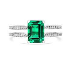 Presenting our Vintage Colombian Created Emerald Ring, crafted in 925 Sterling Silver with a lustrous White Rhodium Over Silver. This Green Gemstone Ring piece features an octagon-cut Colombian Emerald as the main stone, measuring 8x6mm and weighing 1.8 carats, exuding elegance. With a metal weight of 3.50 grams, this ring is available in sizes 5, 6, 7, and 8. Adorned with shimmering Moissanite accents, this double band ring makes a bold statement. Perfect as a May birthstone ring or a vintage-i Double Band Ring, May Birthstone Rings, Green Gemstone Ring, Double Band Rings, Wedding Anniversary Rings, Colombian Emeralds, May Birthstone, Green Gemstones, Anniversary Ring