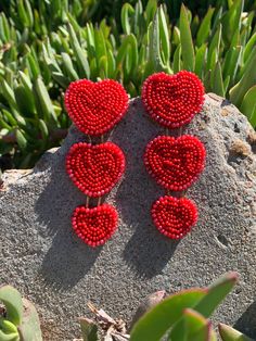 Handmade red Statement beaded earrings. Red Chandelier Earrings As Gift, Red Heart Beads Dangle Earrings, Red Heart Beads Earrings For Party, Red Dangle Earrings With Heart Beads, Red Dangle Heart Earrings, Red Heart Beads Earrings For Valentine's Day, Red Dangle Earrings For Valentine's Day, Red Beaded Dangling Earrings As Gift, Red Heart Bead Drop Earrings