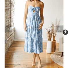 Bought From A Boutique For A Trip. Adorable Pattern And Keyhole Opening. It Was Too Tight In The Top (Bra Size Is 34c) Otherwise It Was Perfect! Knee-length Strapless Sundress For Vacation, Strapless Knee-length Sundress For Vacation, Light Blue Strapless Midi Dress For Summer, Casual Blue Strapless Midi Dress, Blue Strapless Midi Dress For Day Out, Strapless Blue Midi Dress For Day Out, Blue Strapless Sleeveless Dress For Vacation, Light Blue Strapless Sundress, Summer Strapless Midi Dress For Brunch