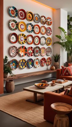 a living room filled with furniture and plates on the wall