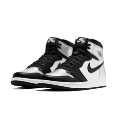 This WMNS Air Jordan 1 High OG “Silver Toe” is dressed in a Black, Metallic Silver, and White colorway. Black leather overlays an otherwise tumbled white upper across the toe cap, Swoosh, ankle, and tongue. Jordan Model, Womens Air Jordans, Limited Edition Sneakers, Jordan 1 High Og, Air Jordan 1 Retro High Og, Air Jordan 1 Retro High, Air Jordan 1 High, Womens Athletic Shoes, Jordan 1 High