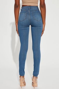 Say hi to your waist as you slip into our best-selling flexible stretch denim pants. The Classic High Waist Skinny Jeans feature a dark wash, 2 back pockets, 2 faux front pockets, a zip fly closure, and are available in Curve. Providing a seamless transition from day to night, these jeans are a wardrobe essential. Available In Multiple Washes Available in Petite 28" Inseam, Regular 31" Inseam, & Tall 34" Inseam 11" High Rise Skinny Jean High Stretch Faux Front Pockets Functional Back Pockets Dis Stretch Denim Pants, Seamless Transition, Say Hi, High Jeans, Medium Blue, Jeans Style, Denim Pants, Wardrobe Essentials, Stretch Denim