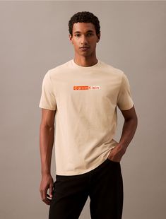 Crafted from 100% cotton, this t-shirt is soft and breathable, perfect for everyday wear. Styled with short sleeves and a crewneck. Cut in a classic fit and features a printed graphic at the front.  Material: 100% Cotton. Logo Graphic, Calvin Klein, Everyday Wear, Short Sleeves, Crew Neck, ? Logo, T Shirt, How To Wear