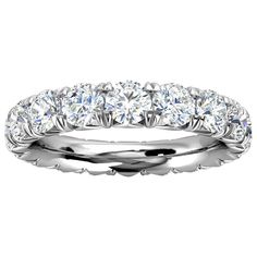 From our signature French-Pave wedding band collection, this eternity ring features perfectly matched round brilliant diamonds . Experience the Difference! Product details: Center Gemstone Color: WHITE Side Gemstone Type: NATURAL DIAMOND Side Gemstone Shape: ROUND Metal: Platinum Setting Type: French Pave Shank Height: 3.7 Shank Height: 2.8 Material: NATURAL DIAMOND Engravable: yes Minimum Color: G Minimum Clarity: vs2 Rhodium Plate: Yes Sizable: Yes Contemporary Wedding Rings, Modern Wedding Rings, Pave Wedding Bands, Diamond Half Eternity Band, Gold Diamond Band, Pave Diamond Ring, Eternity Ring Diamond, Eternity Band Diamond, Diamond Eternity