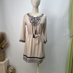 Women's Boho Dress V-Neck Embroidery Floral Bohemian Mini Dress Cotton Linen Vintage Dress Peasant Style Embroidered V-neck Dress, Casual V-neck Dress With Embroidered Neckline, Casual Boho Dress With Floral Embroidery V-neck, Folk Style Boho Print V-neck Dress, Embroidered V-neck Bohemian Dress, Bohemian Beige Mini Dress With Floral Embroidery, Beige Bohemian Mini Dress With Floral Embroidery, Folk Style V-neck Dress With Embroidered Hem, Folk V-neck Dress With Embroidered Hem