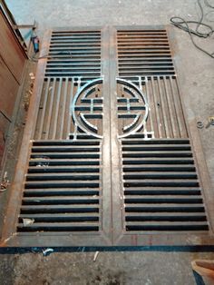 the floor grate is being worked on by someone who has been working on it