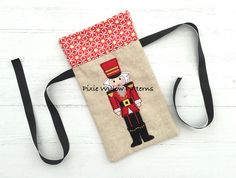 a small bag with an image of a nutcracker on it