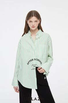 Details: Long sleeve cotton button down shirt in prep green stripes Spread collar Button front closure Oversized cuffs Curved hemline "After-School" graphic printed on front Oversized 'Boy' fit Materials & Care: 100% Cotton Hand wash | Dry clean Do not bleach Size & Fit: Model is 5'7", Bust 32, Waist 24, Hips 35, wearing a size S Item #: IL4BL03 Green Button-up Shirt With Striped Collar, Green Long Sleeve Shirt With Striped Collar, Green Tops With Striped Collar For Work, Green Top With Striped Collar For Work, Oversized Cotton Shirt With Striped Collar, Green Cotton Shirt With Striped Collar, Chic Business Casual, Denim Jean Dress, Boy Fits