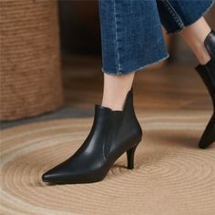 As low as $55.00 Elegant Formal Booties With Low Heel, Pointed Toe Heels With Padded Ankle In Faux Leather, Chic Fitted Low Heel Booties, Elegant Fitted Booties With Low Heel, Elegant Fitted Low Heel Booties, Fitted Faux Leather Booties With Pointed Toe, Black Low Heel Winter Heels, Elegant Low Heel Medium Width Booties, Elegant Low Heel Booties