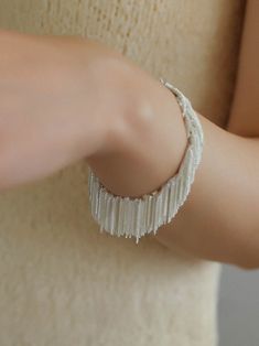 Indulge in romance with our Shining Galaxy Waterfall Tassel Bracelet. Handcrafted with precision, each tassel creates a dance of grace and fluidity, exuding delicate allure. The flowing galaxy cascade evokes subtle luxury and dreamlike reflections, elevating your style with radiant luminance. Metal: Recycled Sterling Silver Plated On Brass Length: 160-180mm Elegant Fringe Jewelry For Weddings, Elegant Fringed Jewelry For Weddings, Subtle Luxury, Edison Pearls, Tassel Bracelet, Tiger Eye Stone, Recycled Sterling Silver, Stone Necklace, Sterling Silver Bracelets