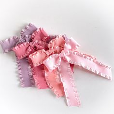 A high quality, double sided satin ruffle bow. The bow measures 4" wide and 6" long. The bow is attached to an 2.25" alligator clip with teeth.   Choose which side of the head it will be worn on. Left side or right side.  Perfect for all ages! Thank you for shopping at Ava Bowtique! Pink Hair Bow, Bow Barrette, Pink Hair Bows, Bow Hair Clip, Bow Hair, Satin Bow, Bow Hair Clips, Double Face, Barrettes