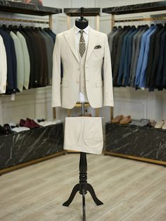 Fitted Beige Single Breasted Sets, Beige Fitted Single Breasted Sets, Fitted Beige Single-breasted Sets, Beige Fitted Single-breasted Sets, Beige Business Casual Suit With Buttons, Beige Suits With Notch Lapel And Button Closure, Tailored Beige Business Sets, Beige Notch Lapel Suit With Button Closure, Beige Suits With Notch Lapel