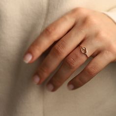 14K Solid Gold Love Knot Ring: A simple knot to symbolize infinite love, this minimalist ring will make the perfect birthday gift, Valentine's day gift, or Mother's day gift for all of the special people in your life.  Materials & Specifications: - 14K solid gold - Available in 3 options: Yellow Gold, Rose Gold, or White Gold  As with all of our products, this item is handmade and made to order. **WEARING YOUR JEWELRY** Show your love to your beautifully handcrafted pieces!  Although we stand behind the craftsmanship of our jewelry, our pieces are delicate and not made to be worn during sports and activities such as cleaning and gardening.  When wearing thin/dainty chain bracelets, take care to avoid getting them caught (e.g. on knit sweaters, blankets, or while searching for items in a pu Minimal Gold Jewelry, Gold Knot Ring, Jewelry Stacking, Love Knot Ring, Future Engagement Rings, Minimal Ring, Infinite Love, Dainty Gold Rings, Celestial Necklace