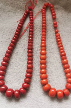 material:natural stone with heat treated coral color quantity:one strand 22inch=57-60pcs size:approx.7X10-17X22mm note:have larger stock and offert wholesale price. Coral Jewelry Indian Gold Chains, Traditional Luxury Red Coral Beaded Necklaces, Luxury Red Coral Necklace With Large Beads, Red Coral Single Strand Round Necklace, Red Beaded Necklaces With Natural Stones, Round Single Strand Red Coral Necklace, Round Red Coral Single Strand Necklace, Orange Red Coral Beads For Jewelry Making, Spiritual Red Coral Necklaces With Polished Beads