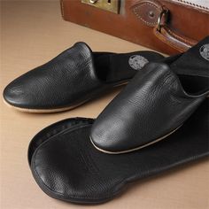 The Troy Travel Slippers in Calf Skin Luxury Slippers With Rubber Sole, Classic Black Slippers, Luxury Slippers With Leather Sole And Calf Leather, Black Leather Slippers With Leather Lining, Luxury Leather Footbed Slip-on Slippers, Comfortable Black Leather Slippers, Leather Slippers With Suede Lining, Slip-on Style, Leather Slip-on Slippers With Suede Lining, Classic Black Slippers With Rubber Sole