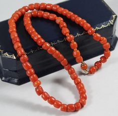 -Antique 9k Gold Natural Orange Red Coral Necklace -Total length: 16 in -Biggest bead size:5.75 mm x 5.65 mm -Smallest bead size: 4.25 mm x 5.4 mm -Total weight: 19.7 g -Not perfectly round Luxury Traditional Orange Beaded Necklace, Classic Red Coral Formal Jewelry, Classic Necklace With Spacer Beads For Gift, Classic Orange Necklace For Formal Occasions, Classic Orange Necklaces For Formal Occasions, Orange Classic Formal Necklaces, Orange Classic Formal Necklace, Classic Red Jewelry With Polished Beads, Classic Red Hand-strung Necklaces