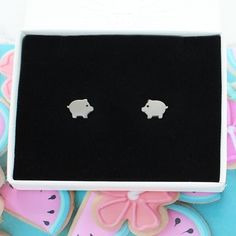 A cute pair of Pig shaped stainless steel stud earrings Each pair arrives in a striking white gift box with a contrasting silver logo. A free gift wrapping service is also available upon request. Silver Logo, Logo A, Gift Wrapping Services, White Gift Boxes, Free Gift Wrapping, Simple Earrings, Jewelry Earrings Studs, Free Gift, Free Gifts