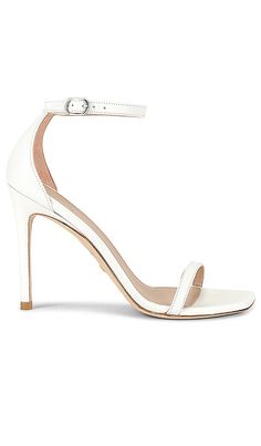 Find STUART WEITZMAN Nudistcurve 100 Sandal on Editorialist. Stuart Weitzman Nudistcurve 100 Sandal in White. - size 10 (also in 8, 9, 9.5) Stuart Weitzman Nudistcurve 100 Sandal in White. - size 10 (also in 8, 9, 9.5) Leather upper with leather sole. Made in Spain. Ankle strap with leather buckle closure. Angled square toe. Stuart Weitzman logo on sole. Includes dust bag. Approx 100mm/ 4 inch heel. STUA-WZ392. SA194. Stuart Weitzman crafts precisely engineered shoes designed for high fashion an Stuart Weitzman Sandals, White Sandals Heels, Shoe Company, Black Sandals Heels, Leather High Heels, White Sandals, Stuart Weitzman Shoes, 4 Inch Heels, Shoes Leather