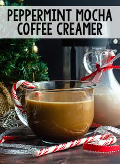 peppermint mocha coffee creamer in a glass mug with candy canes